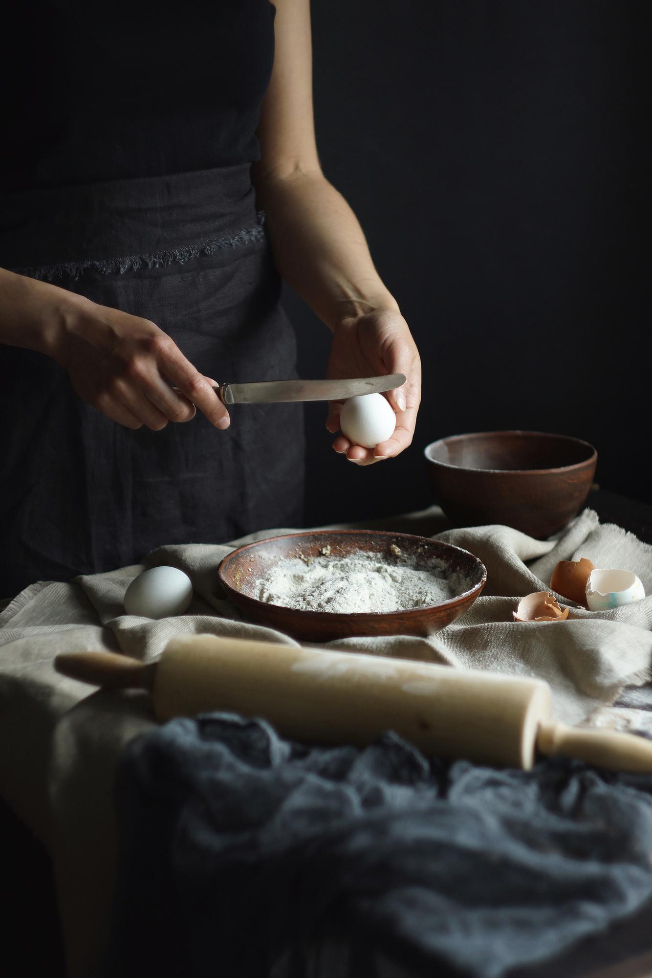 Workshop hands preparing pastry in luxury kitchen